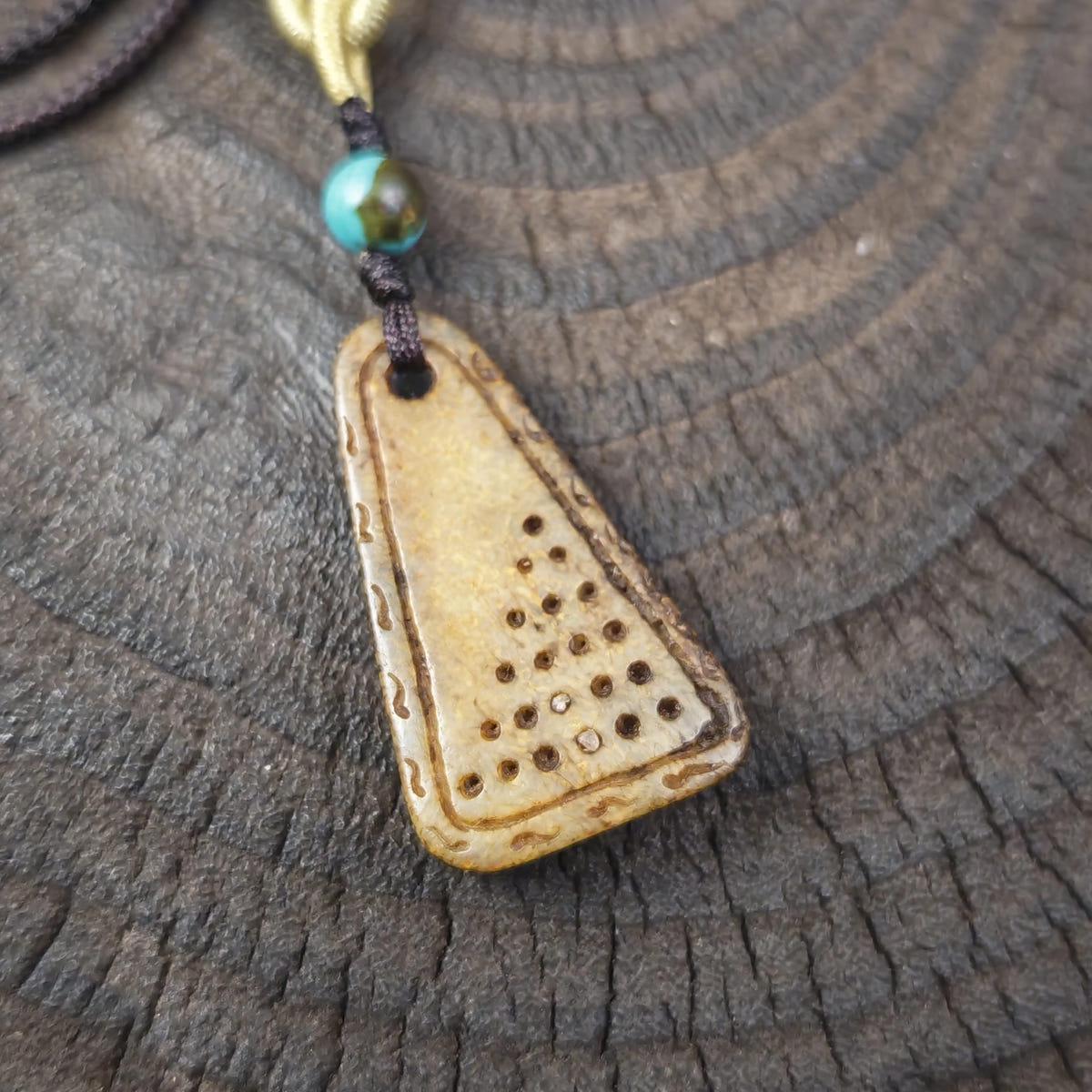 Kapala Amulet Pendant - Mantra Dots - Tibetan Buddhist amulet, close-up detail