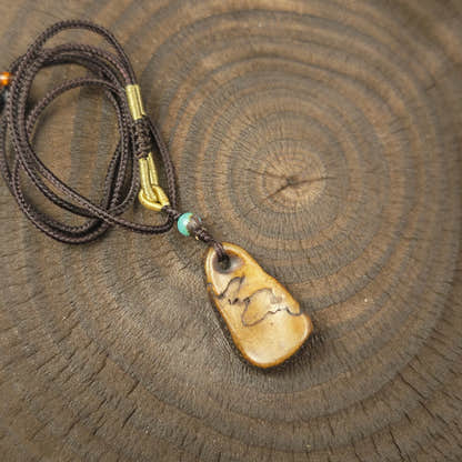 Kapala Amulet Pendant - Conch Shell - Tibetan Buddhist amulet, detailed view