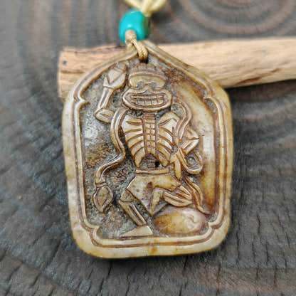 amulet Garuda - Tibetan Buddhist amulet, close-up detail
