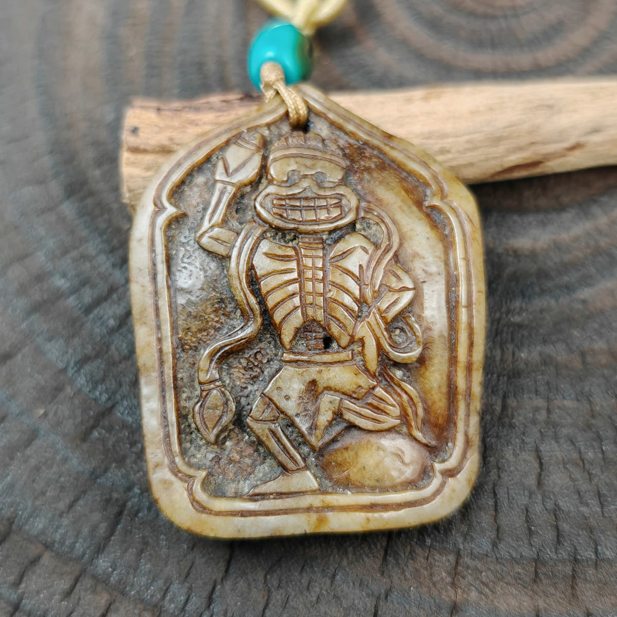 amulet Garuda - Tibetan Buddhist amulet, close-up detail