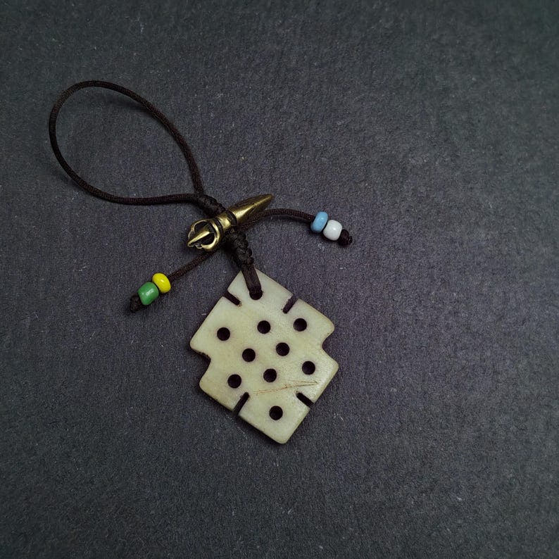 Handcarved Yak Bone Lucky Knot Amulet / Endless Knot Pendant - Tibetan Buddhist amulet, size reference