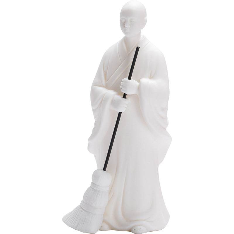 Sweeping Monk Buddha Statue - Tibetan Buddhist statue, close-up detail