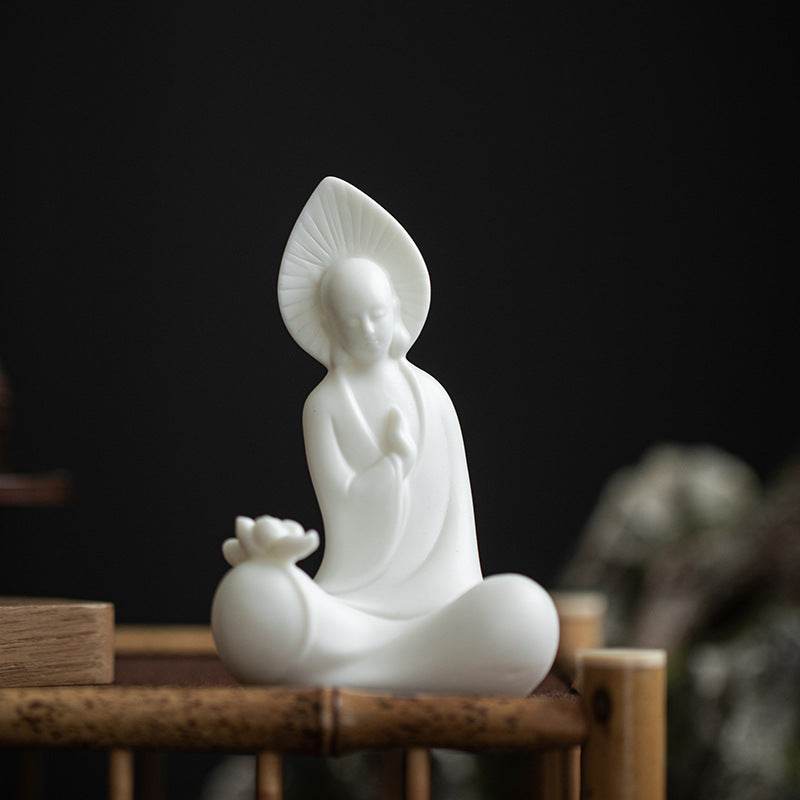 White Porcelain Buddha Statue - Tibetan Buddhist statue, close-up detail