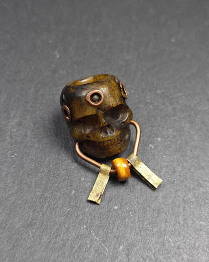 Tibetan Citipati Skull Pendant - 27 - Tibetan Buddhist amulet, front view