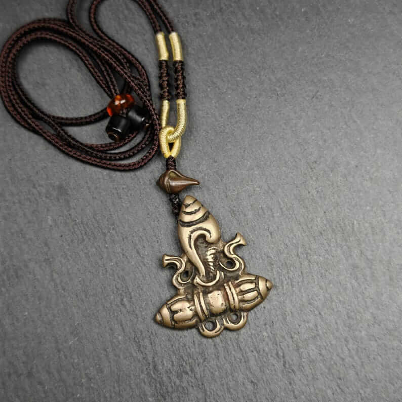 Tibetan Amulet - Tibetan Buddhist amulet, close-up detail