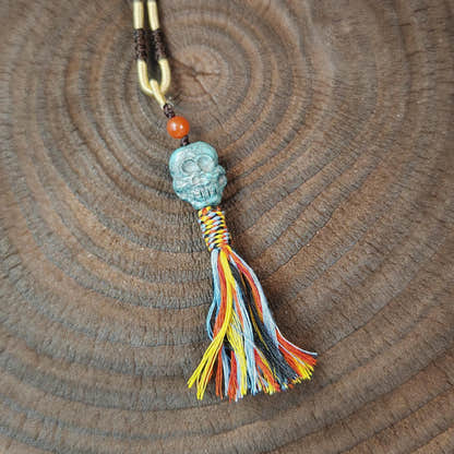 Turquoise Citipati Skull Pendant - Authentic Tibetan Amulet 18mm - Tibetan Buddhist amulet, close-up detail