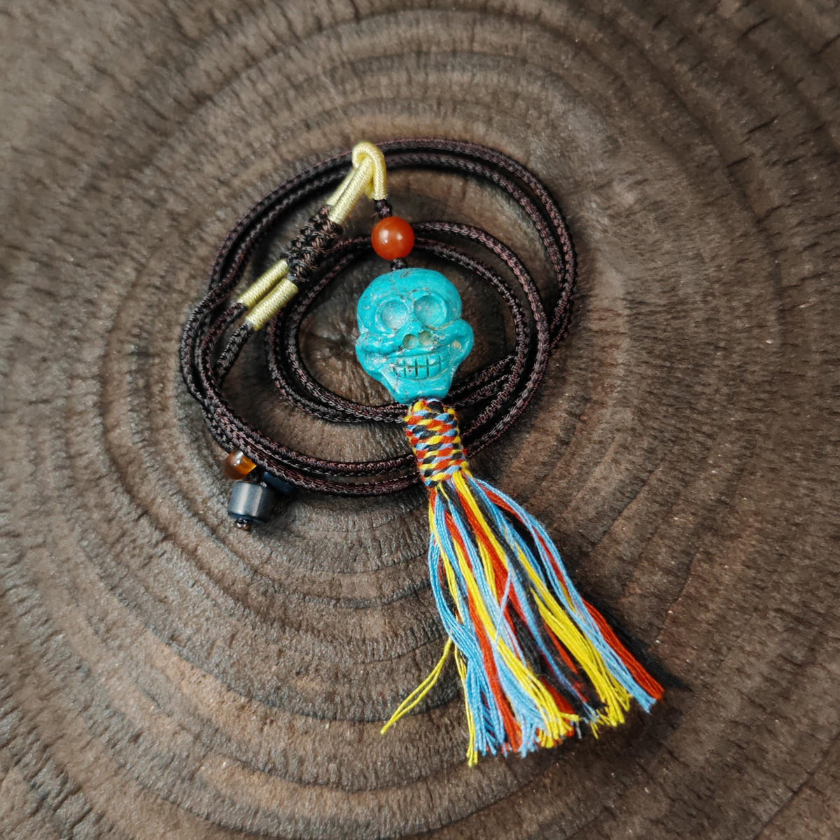 Turquoise Citipati Skull Pendant Decades Old - 19mm - Tibetan Buddhist amulet, close-up detail