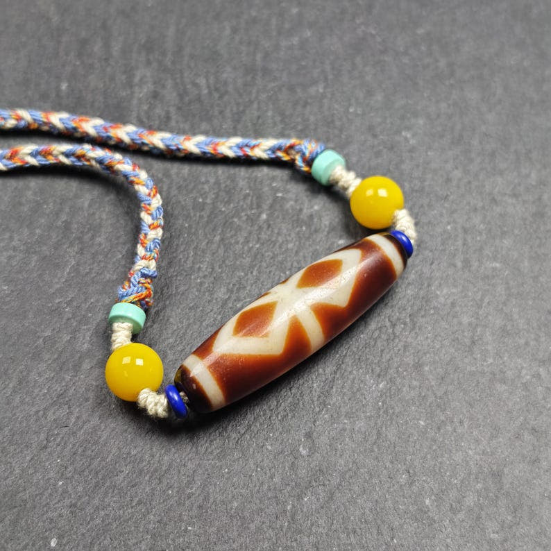 Vintage Fire Agate Dzi Necklace - Tibetan Buddhist bead necklace, detailed view