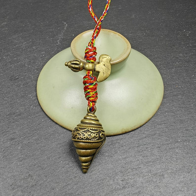Shankha Shell - Divine Conch Amulet - Tibetan Buddhist amulet, close-up detail