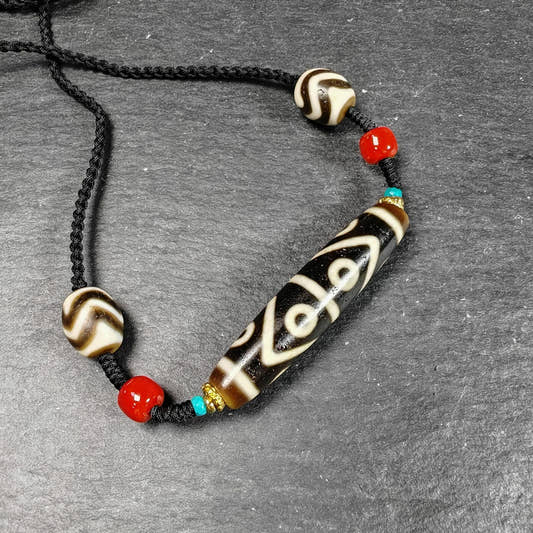 Vintage Wave 8 Eyes Dzi Bead Necklace - Tibetan Buddhist bead necklace, front view