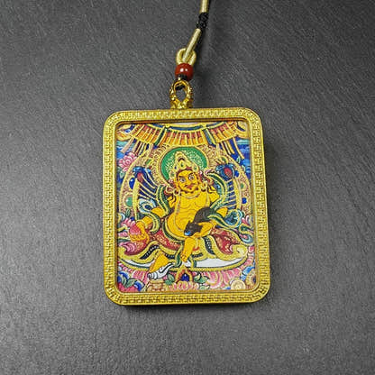 Yellow Jambhala Gau Box Amulet - Tibetan Buddhist amulet, front view