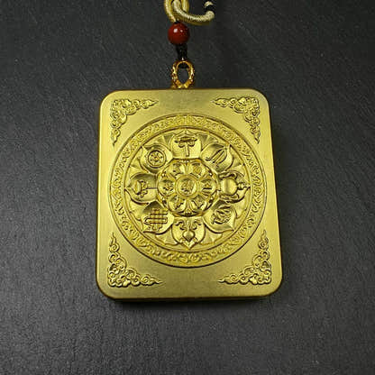 Yellow Jambhala Gau Box Amulet - Tibetan Buddhist amulet, detailed view