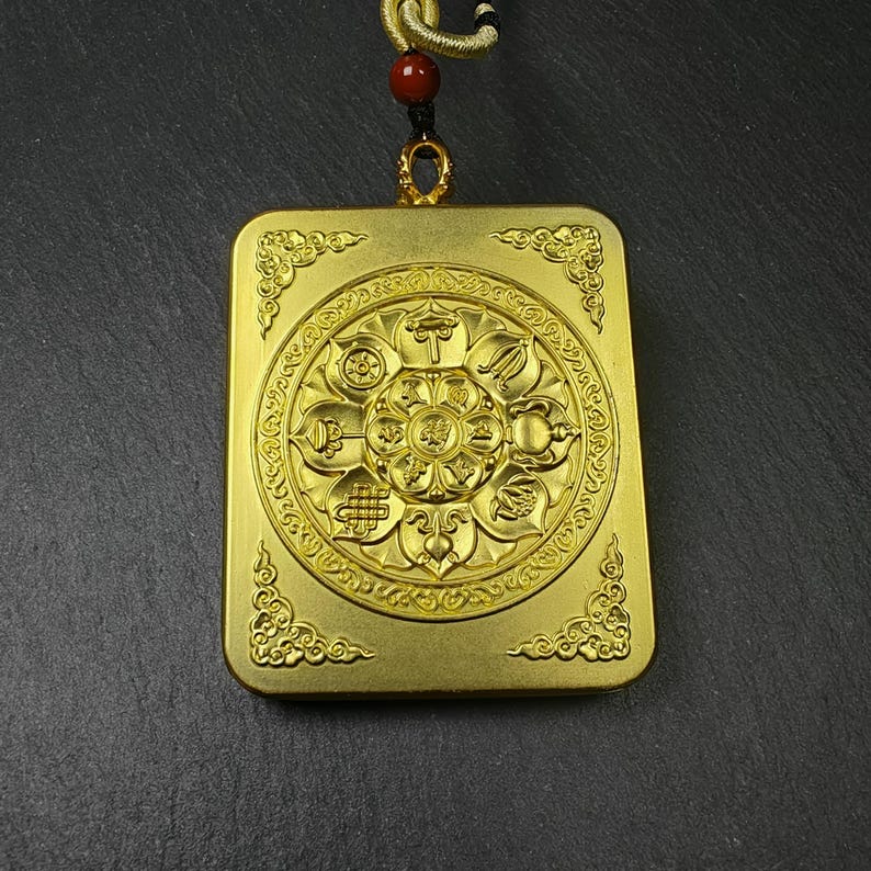 Yellow Jambhala Gau Box Amulet - Tibetan Buddhist amulet, detailed view