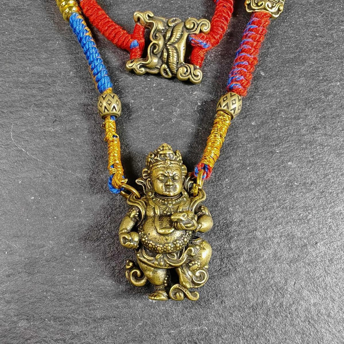 Yellow Jambhala Wealth Deity Amulet, Hand Woven Five-Color Cord - Tibetan Buddhist amulet, view 5