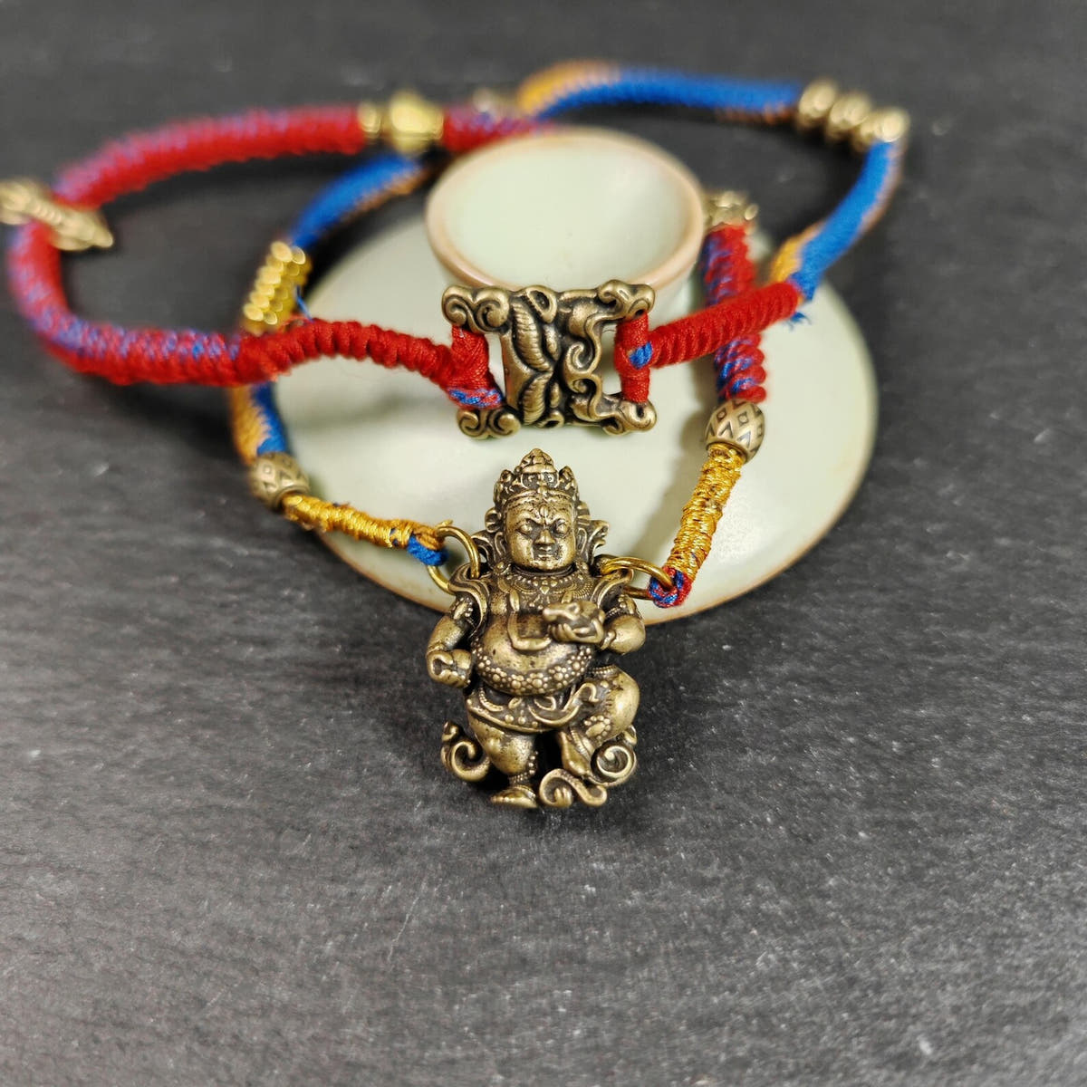 Yellow Jambhala Wealth Deity Amulet, Hand Woven Five-Color Cord - Tibetan Buddhist amulet, view 7
