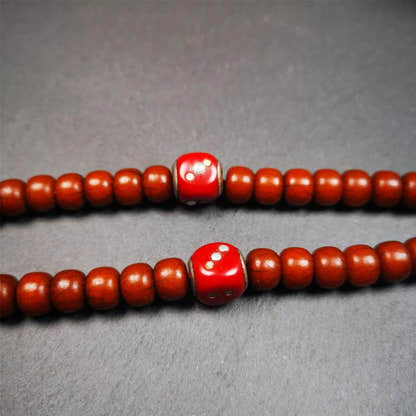 1 Pair of Plastic Dice Beads 0.47" - Tibetan Buddhist art, close-up detail