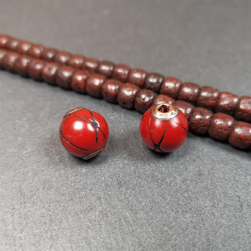 1 Pair of Tibetan Plastic Spacer Beads 0.6" - Tibetan Buddhist art, close-up detail