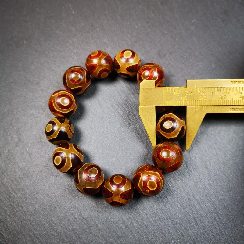 3 Eyes Dzi Bead Bracelet 0.63" - Tibetan dzi bead, size reference
