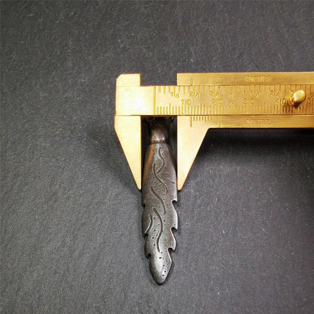 Manjusri Sword Amulet 2.8" - Tibetan Buddhist amulet, size reference