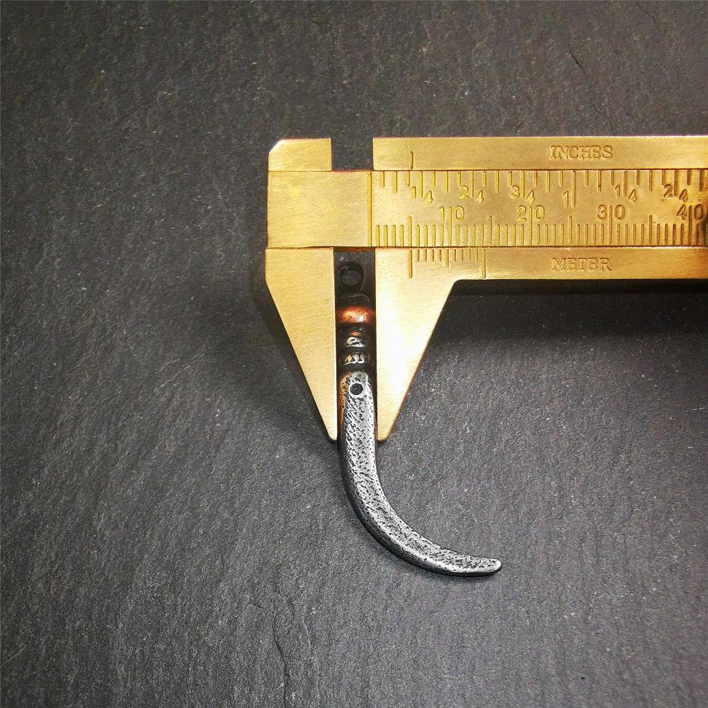 Wolf Tooth Amulet 1.77" - Tibetan Buddhist amulet, size reference
