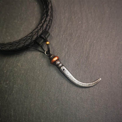 Wolf Tooth Amulet 1.77" - Tibetan Buddhist amulet, front view