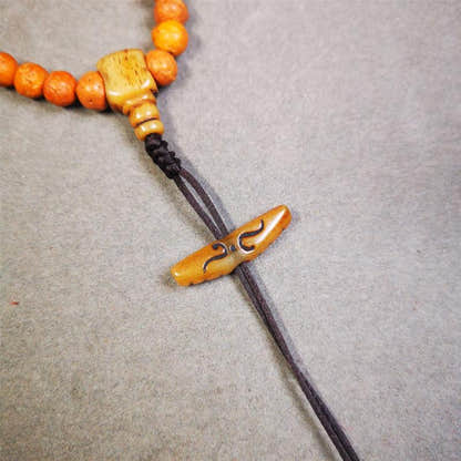 Bone Ruyi Amulet Pendant 1.1" - Tibetan Buddhist amulet, front view