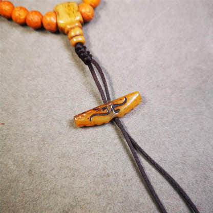 Bone Ruyi Amulet Pendant 1.1" - Tibetan Buddhist amulet, detailed view