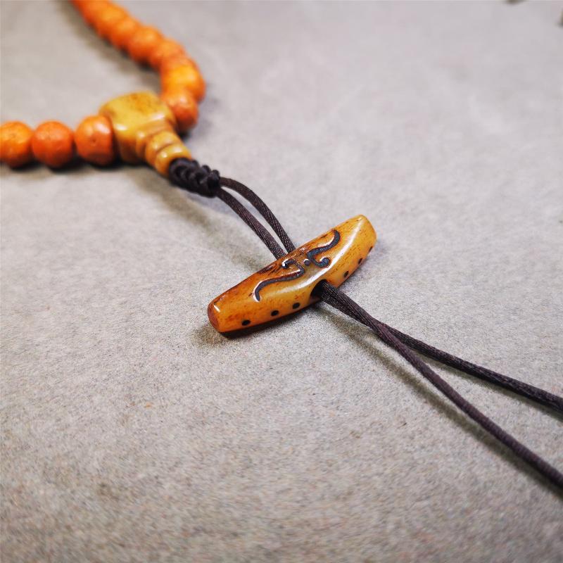 Bone Ruyi Amulet Pendant 1.1" - Tibetan Buddhist amulet, close-up detail
