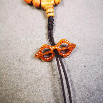 Bone Vajra Amulet 1.18" - Tibetan Buddhist amulet, front view
