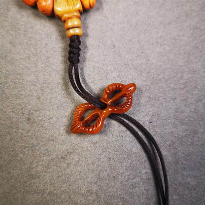 Bone Vajra Amulet 1.18" - Tibetan Buddhist amulet, close-up detail