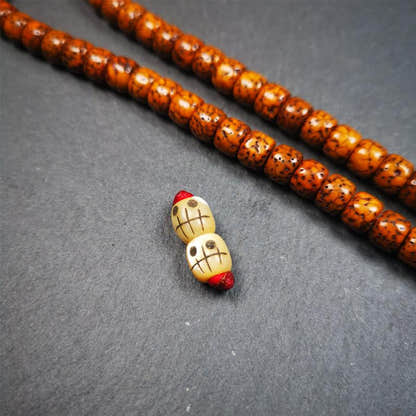 1 Pair of Fish Bone Skull Beads 0.3" - Tibetan Buddhist art, detailed view