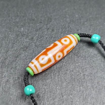 Fire Agate 9 Eyes Dzi Bead Necklace - Tibetan Buddhist bead necklace, detailed view
