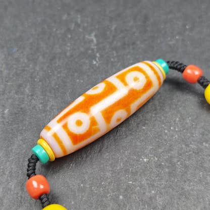 Fire Agate 9 Eyes Dzi Bead Necklace - Tibetan Buddhist bead necklace, close-up detail