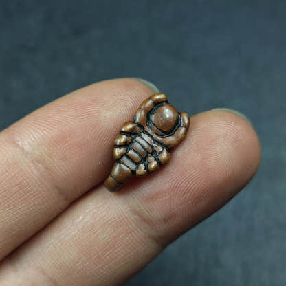 Scorpion Guru Amulet of Padmasambhava - Tibetan Buddhist amulet, close-up detail
