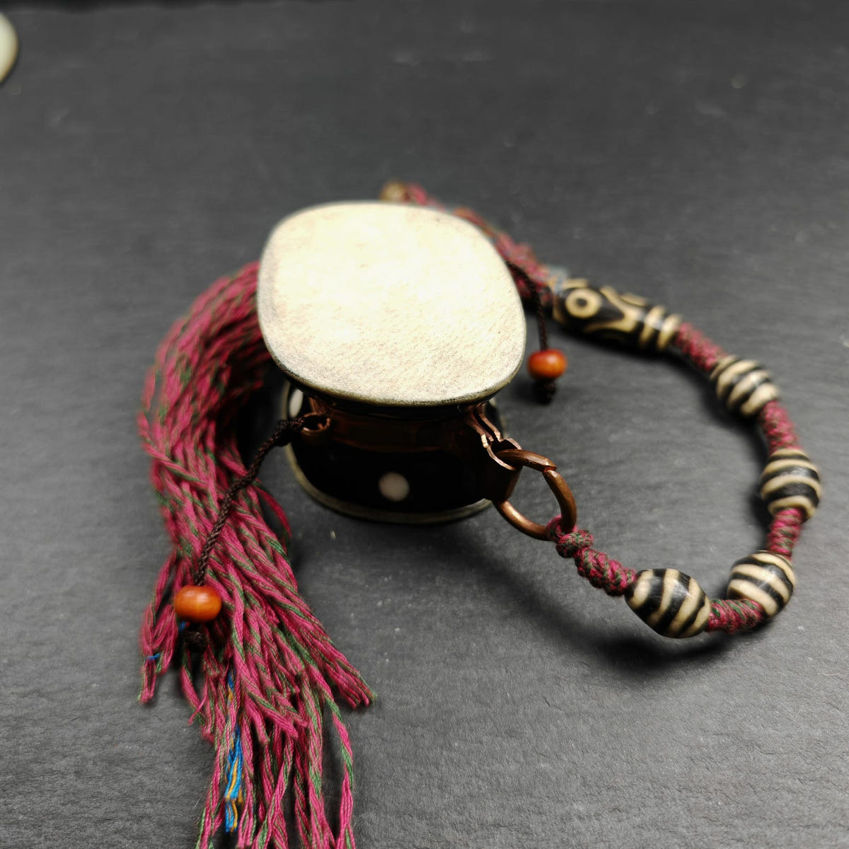 Portable Tibetan Chöd - Damaru Drum - Tibetan Buddhist art, close-up detail