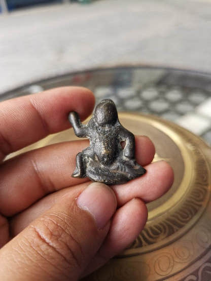 Buddhist Protective Pendant,Abstract Wrathful Vajrapani Amulet Badge,Made of Tho - Tibetan Buddhist amulet, close-up detail