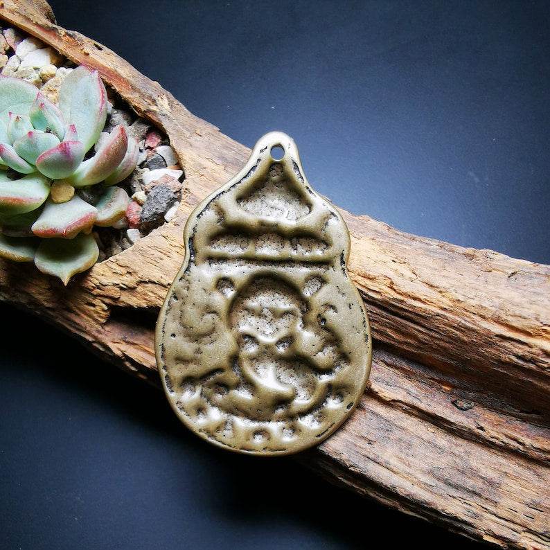 Buddhist Protective Pendant,Snow Lion Amulet Badge - Tibetan Buddhist amulet, detailed view