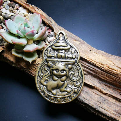 Buddhist Protective Pendant,Snow Lion Amulet Badge - Tibetan Buddhist amulet, close-up detail