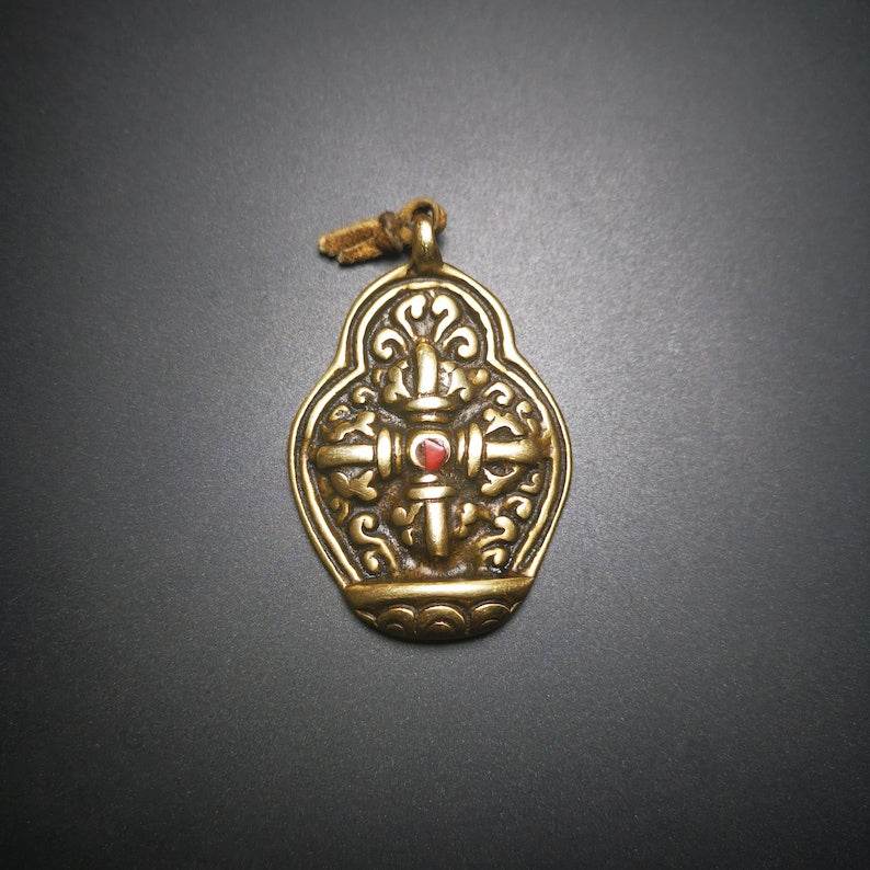 Buddhist Protective Pendant,Cross Vajra Amulet, 50 years old - Tibetan Buddhist amulet, close-up detail