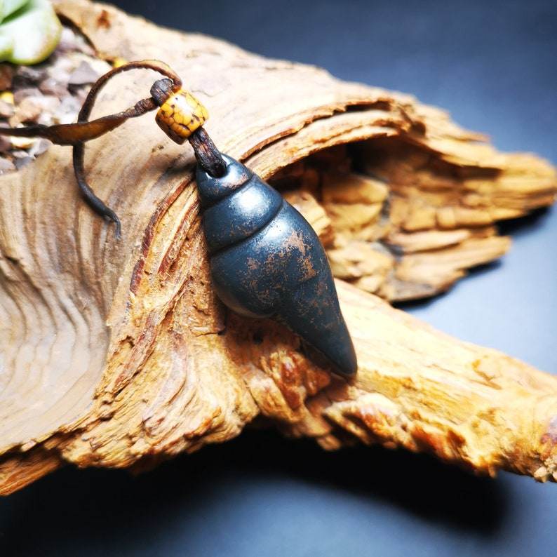 Shankha Divine Conch Amulet - Tibetan Buddhist amulet, close-up detail