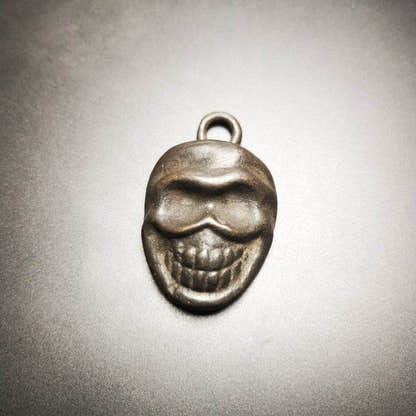 Skull Sītavana Amulet,Smasana Adhipati Pendant,Made of Thokcha - Tibetan Buddhist amulet, close-up detail