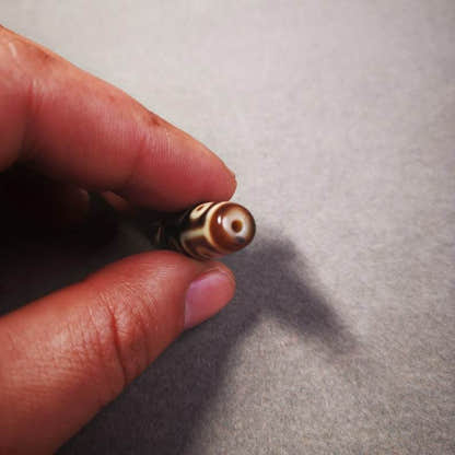 9 Eyes Dzi Bead - Tibetan dzi bead, size reference
