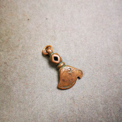 Amulet Pendant,Kartika knife of the dakinis - Tibetan Buddhist amulet, close-up detail