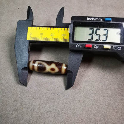 Kubera Dzi Bead - Tibetan dzi bead, view 6