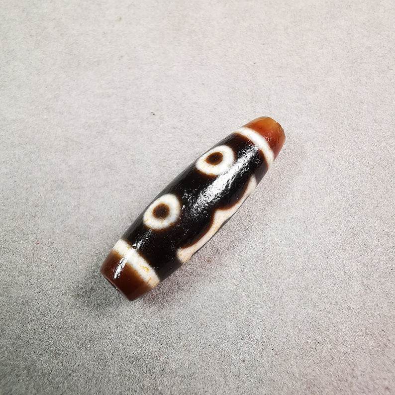 3 Eyed Dzi Bead - Tibetan dzi bead, detailed view