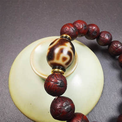 Dalo Dzi Bead Bracelet - Tibetan Buddhist mala beads, close-up detail