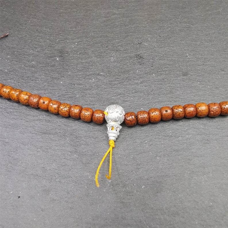 Sterling Silver Guru Bead - Tibetan Buddhist art, close-up detail