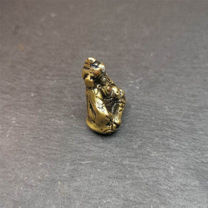 Buddha statue of - Yellow Jambhala Dzambhala - Tibetan Buddhist statue, detailed view