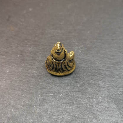 Buddha statue of - Yellow Jambhala Dzambhala - Tibetan Buddhist statue, close-up detail
