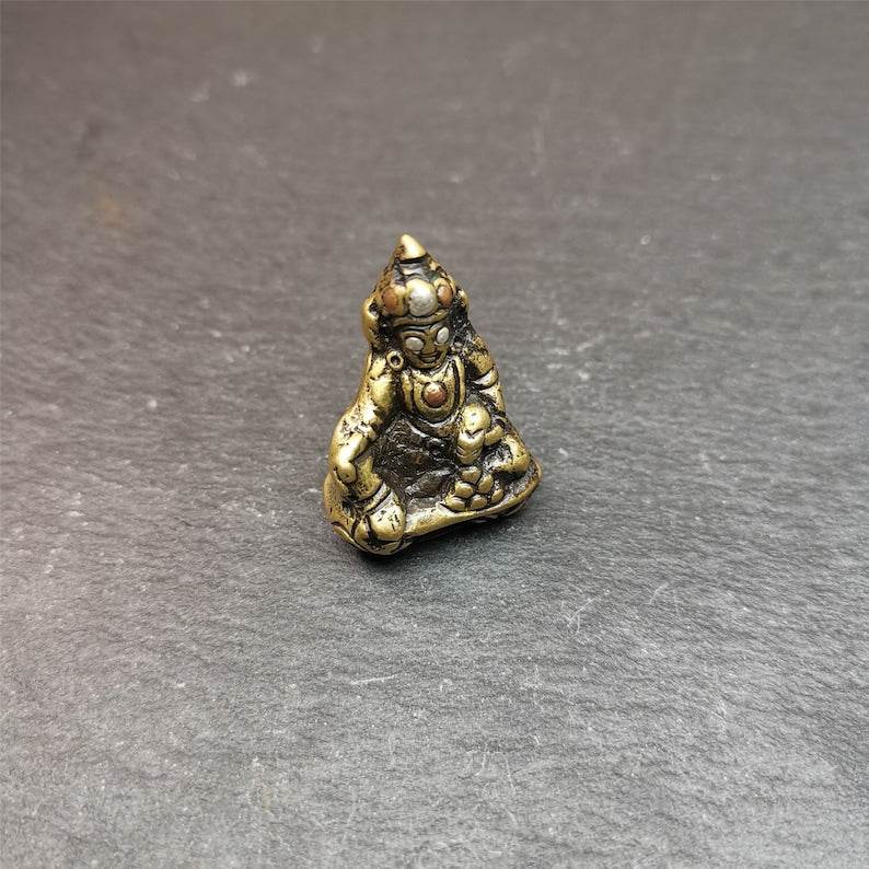 Buddha statue of - Yellow Jambhala Dzambhala - Tibetan Buddhist statue, front view